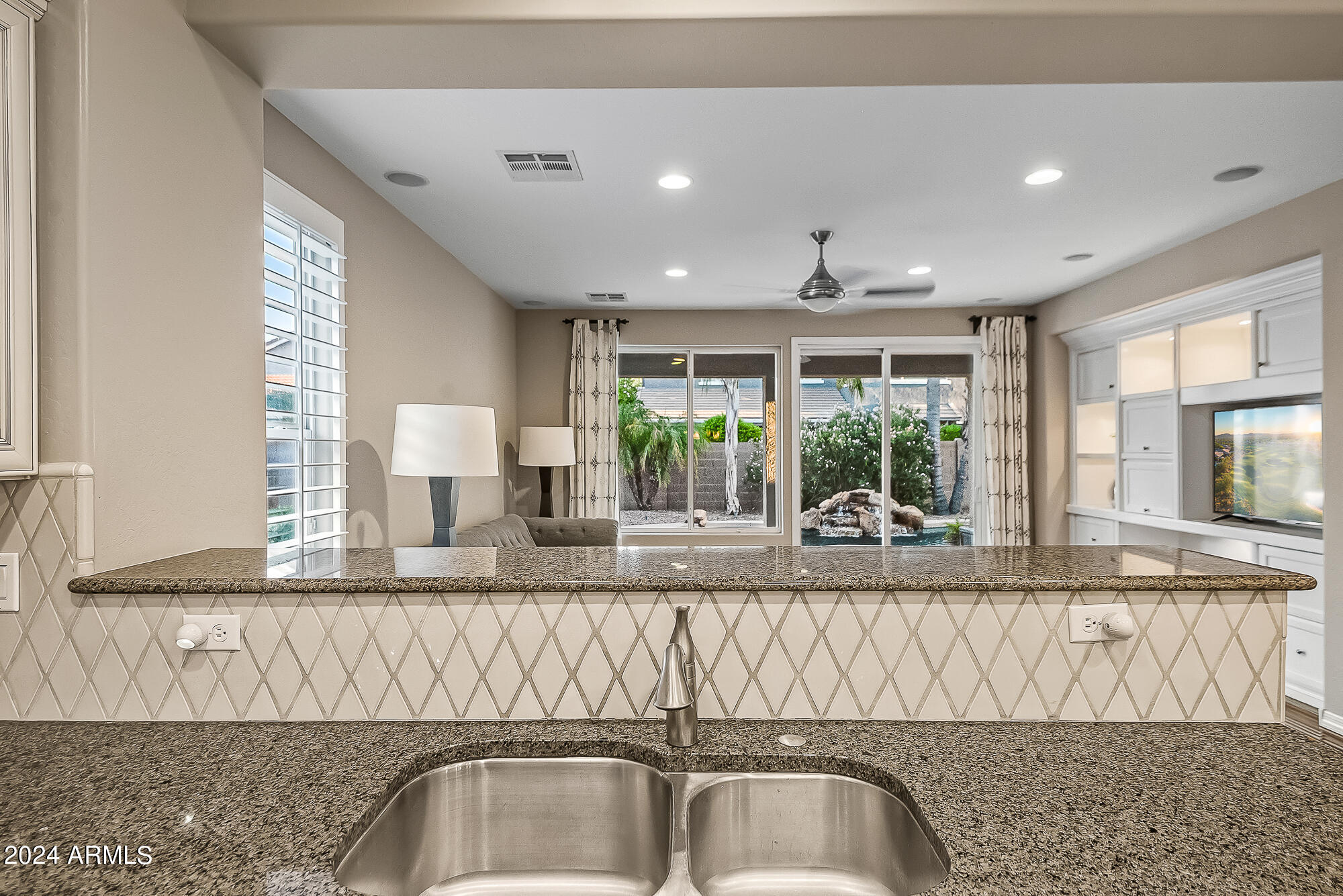 3561 East Weather Vane Road Gilbert, AZ 85296 - Photo 15 of 62 Views to backyard from kitchen