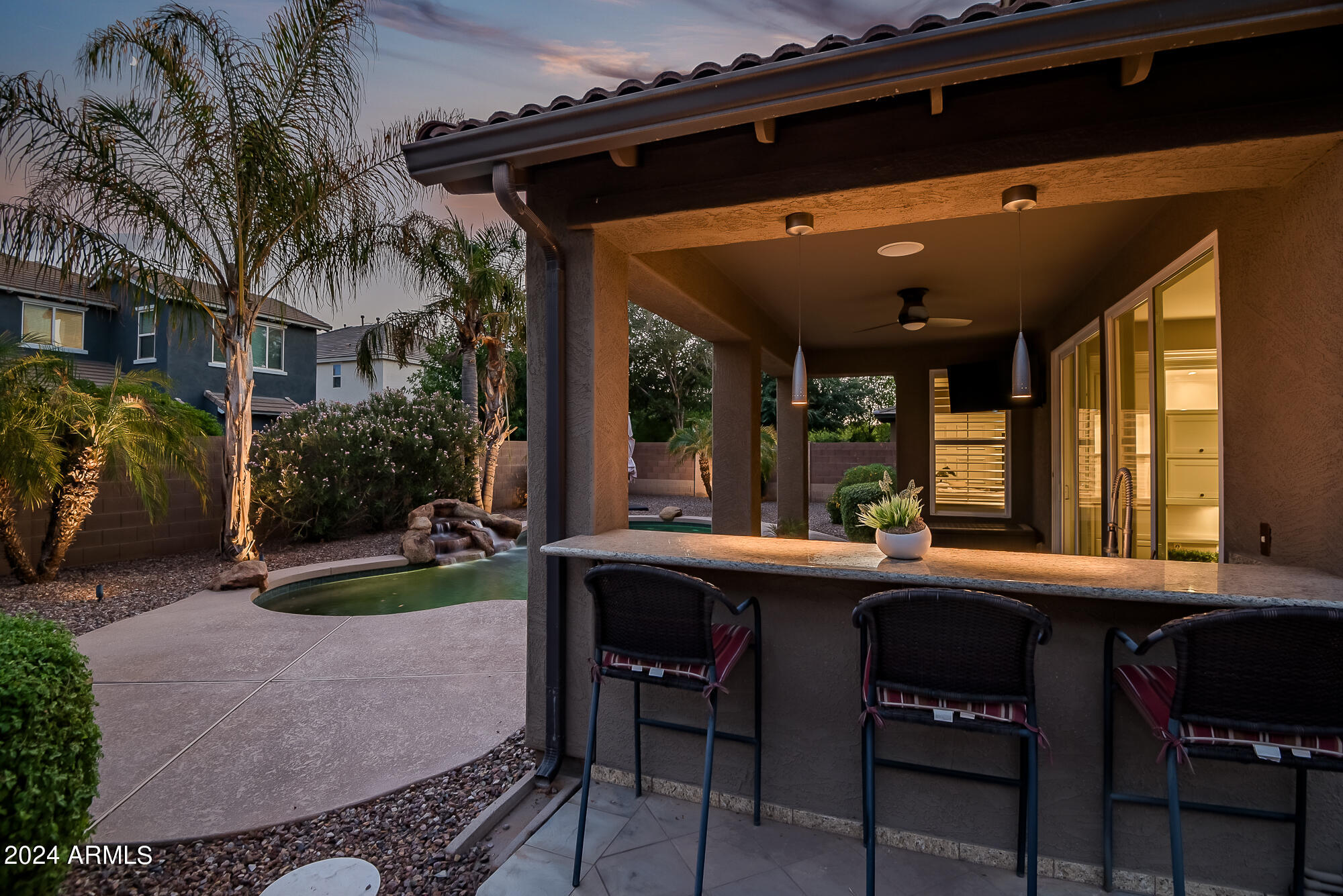 3561 East Weather Vane Road Gilbert, AZ 85296 - Photo 54 of 62 Bar seating on patio