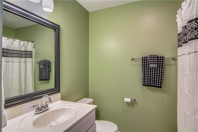 2062 Prescott Way Spring Hill, TN 37174 - Photo 13 of 20 Upgraded guest bath with new light fixtures and faucet. Tile floors are all the bathrooms.