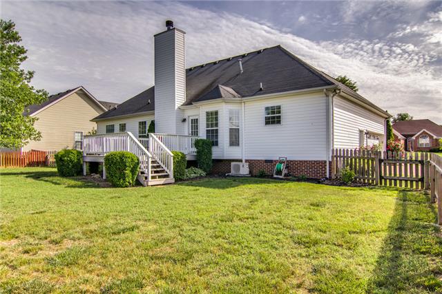 2062 Prescott Way Spring Hill, TN 37174 - Photo 18 of 20 Another view of this spacious yard and nice sized deck for entertaining.