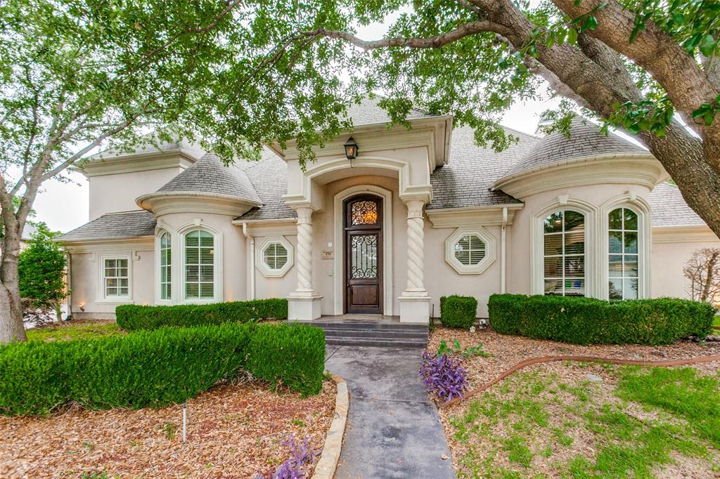 4701 Strait Lane Carrollton, TX 75010 - Photo 1 of 1 a front view of a house with garden