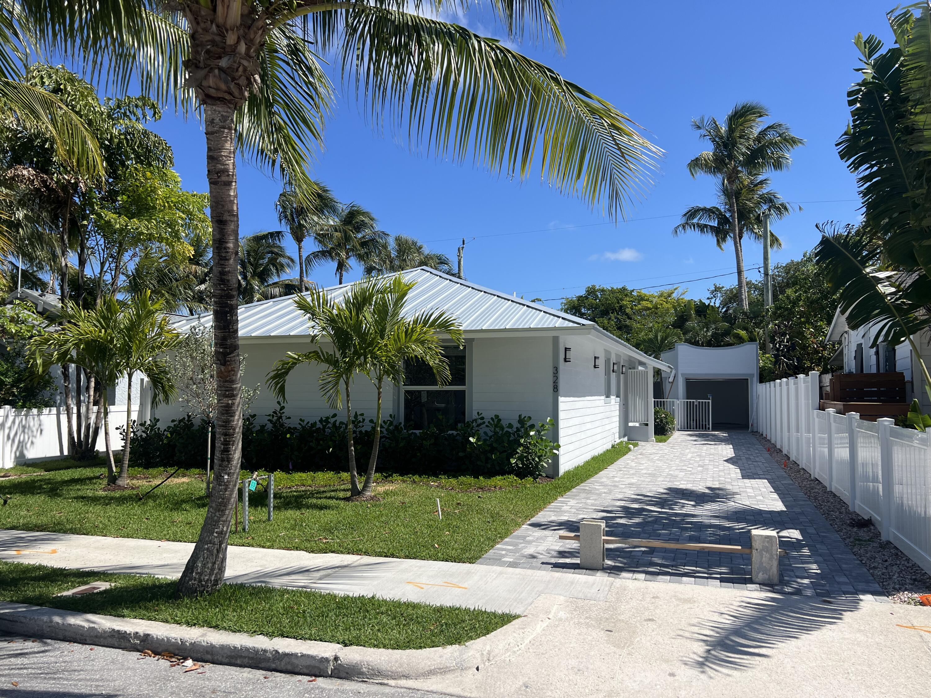 328 Nottingham Boulevard West Palm Beach, FL 33405 - Photo 1 of 22 a front view of house with yard and green space