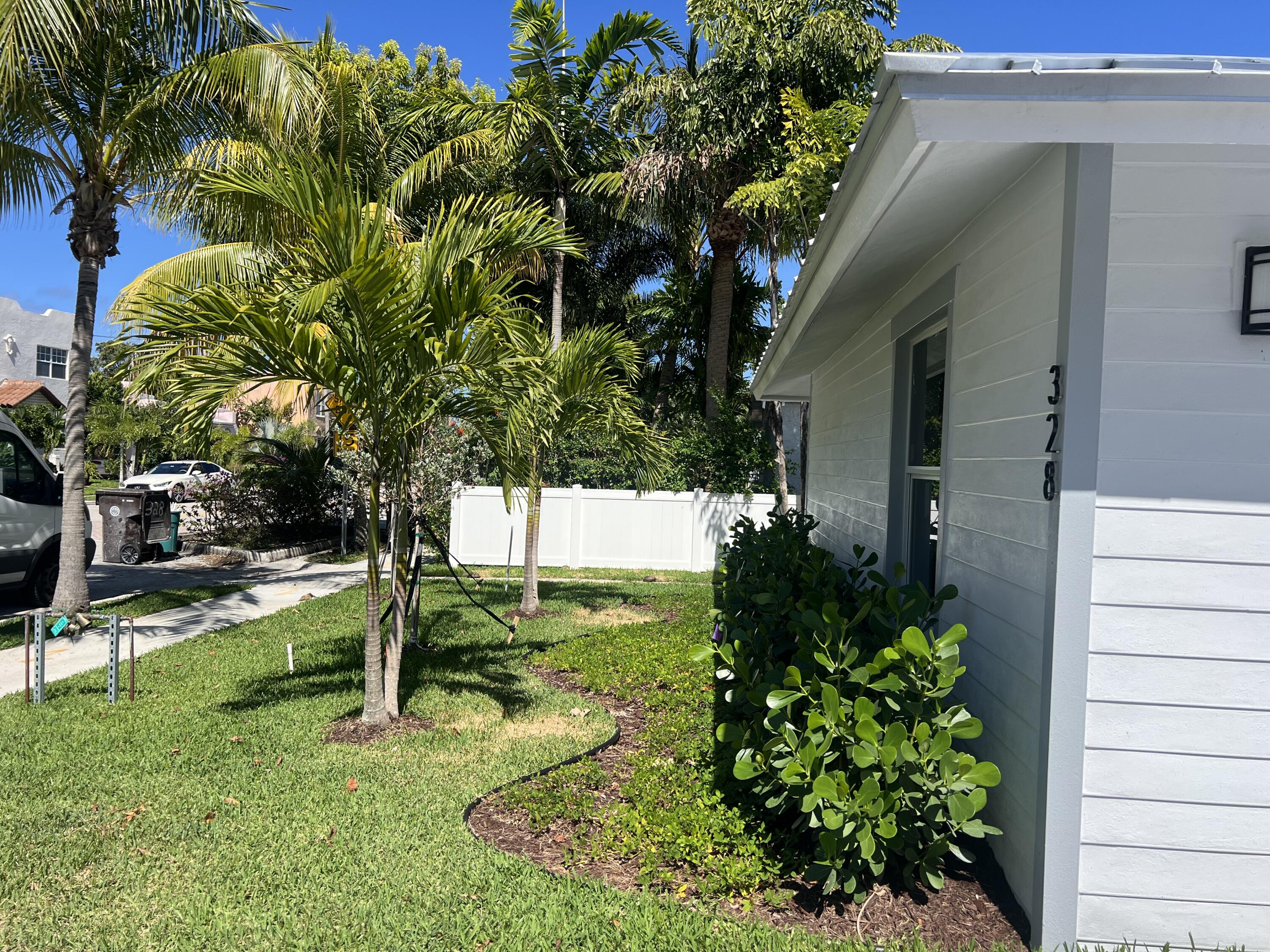 328 Nottingham Boulevard West Palm Beach, FL 33405 - Photo 2 of 22 a view of a backyard with garden