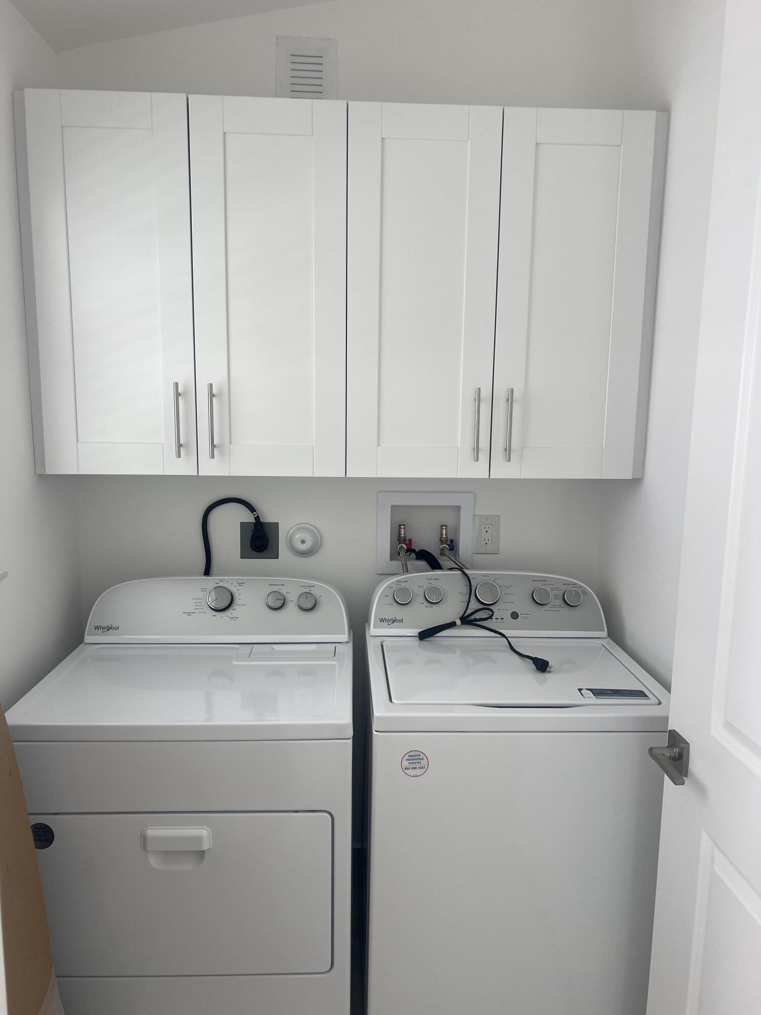 328 Nottingham Boulevard West Palm Beach, FL 33405 - Photo 22 of 22 a utility room with dryer and washer