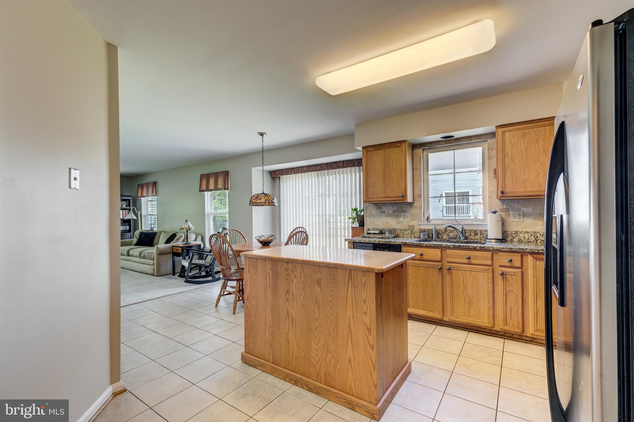 324 Belltown Road Owings Mills, MD 21117 - Photo 12 of 42 Kitchen island comes with the home & expands