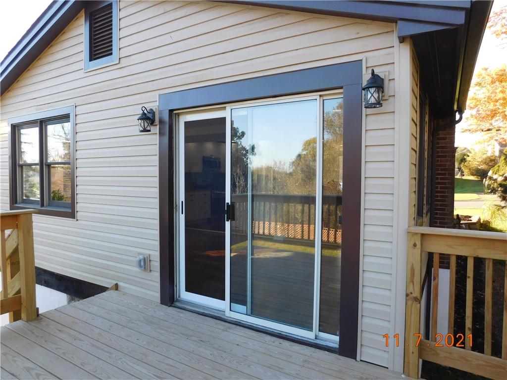 41 Highbury Road Cheswick, PA 15024 - Photo 14 of 19 a view of front door and deck of the house
