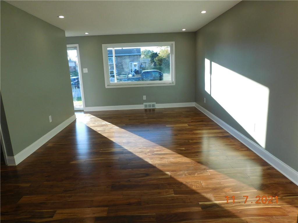41 Highbury Road Cheswick, PA 15024 - Photo 16 of 19 a view of empty room with wooden floor and window