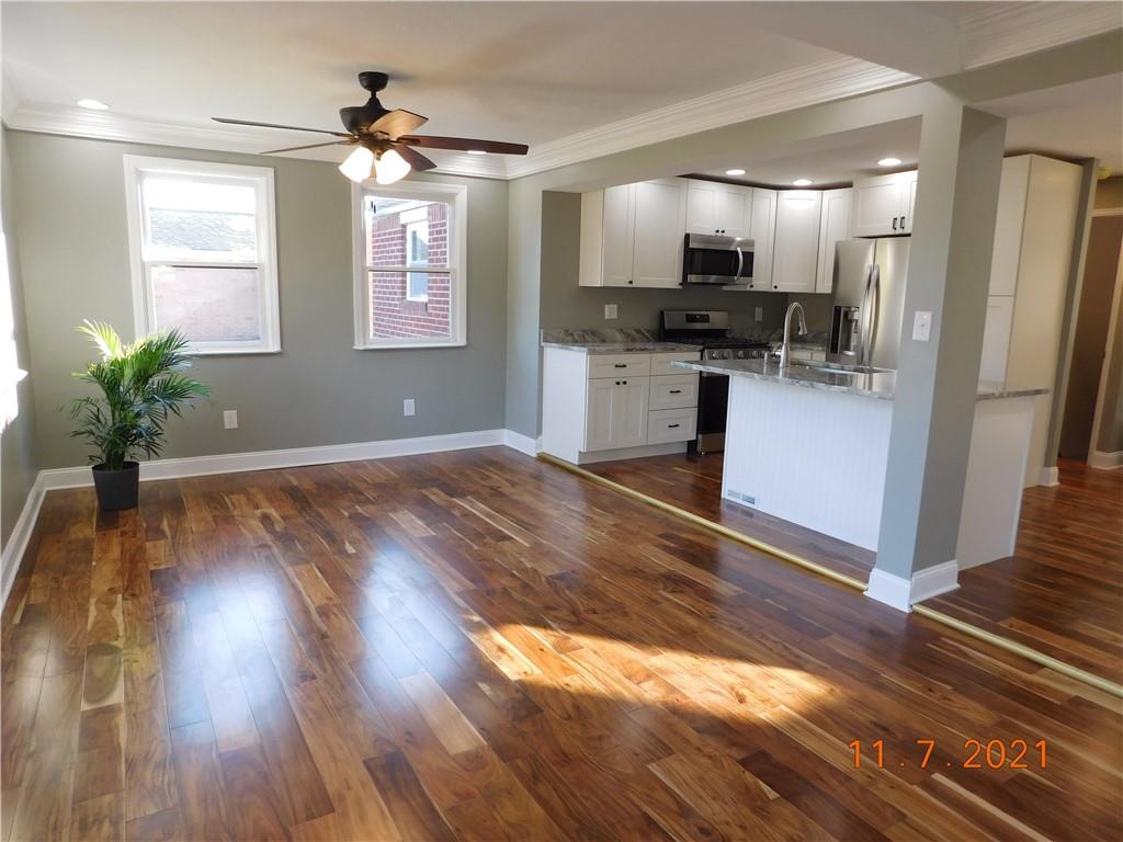 41 Highbury Road Cheswick, PA 15024 - Photo 8 of 19 a kitchen with granite countertop stainless steel appliances a window and a counter space