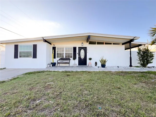 a front view of house with yard
