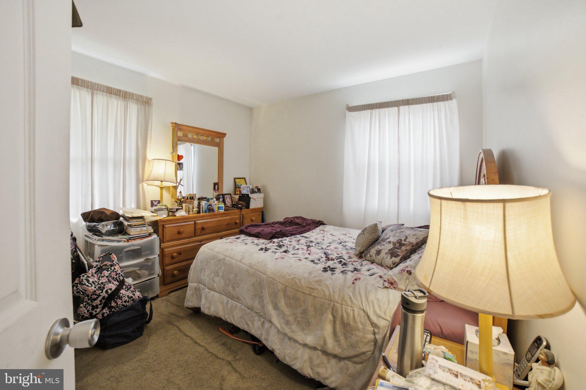 907 Logwood Road Capitol Heights, MD 20743 - Photo 9 of 16 Cozy bedroom with natural light.