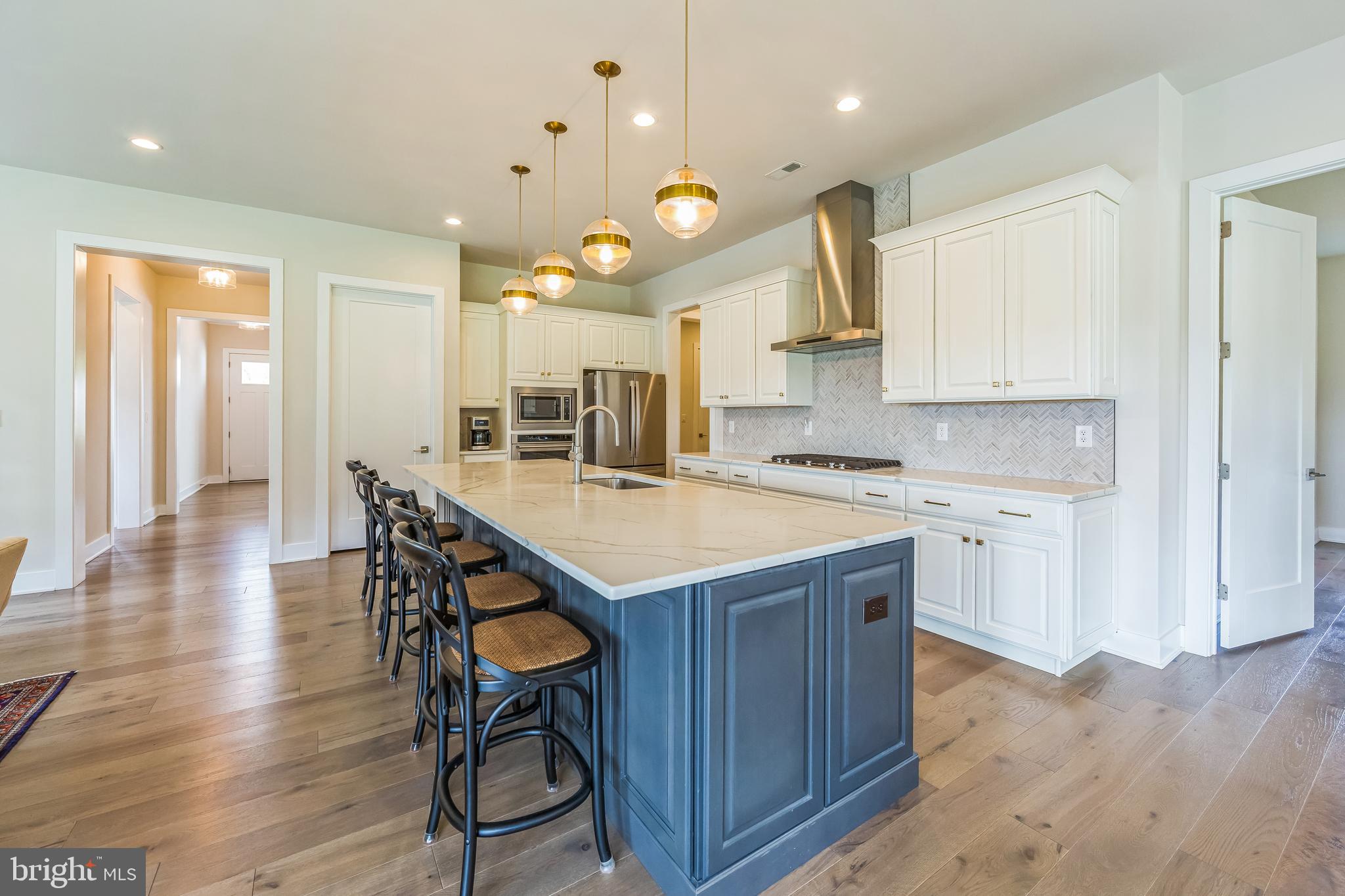 437 Mustang Road Downingtown, PA 19335 - Photo 8 of 35 Hardwood Floor w/ Quartz Countertops