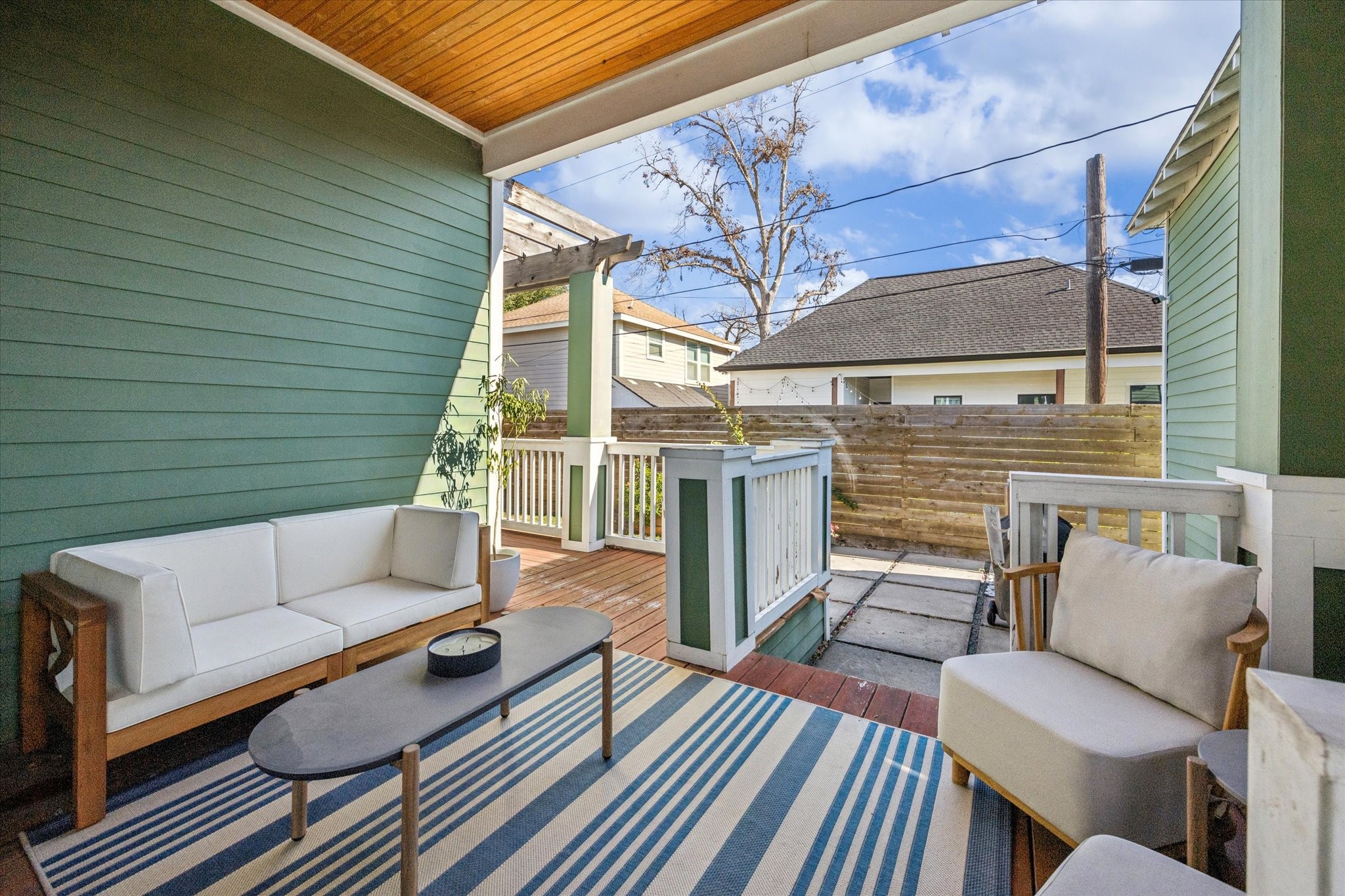 304 Walton Street Houston, TX 77009 - Photo 23 of 28 The outdoor deck opens up to backyard area and garage.