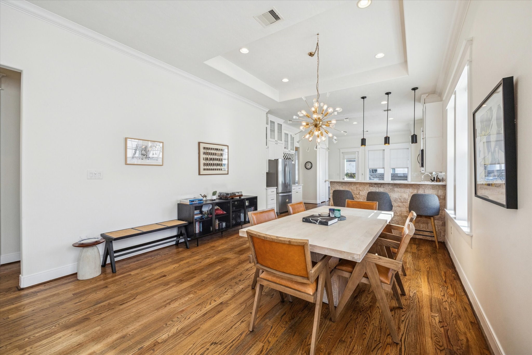 304 Walton Street Houston, TX 77009 - Photo 6 of 28 The dining space allows for a nice size dining table to enjoy and plenty of room for bar stools at the breakfast bar.