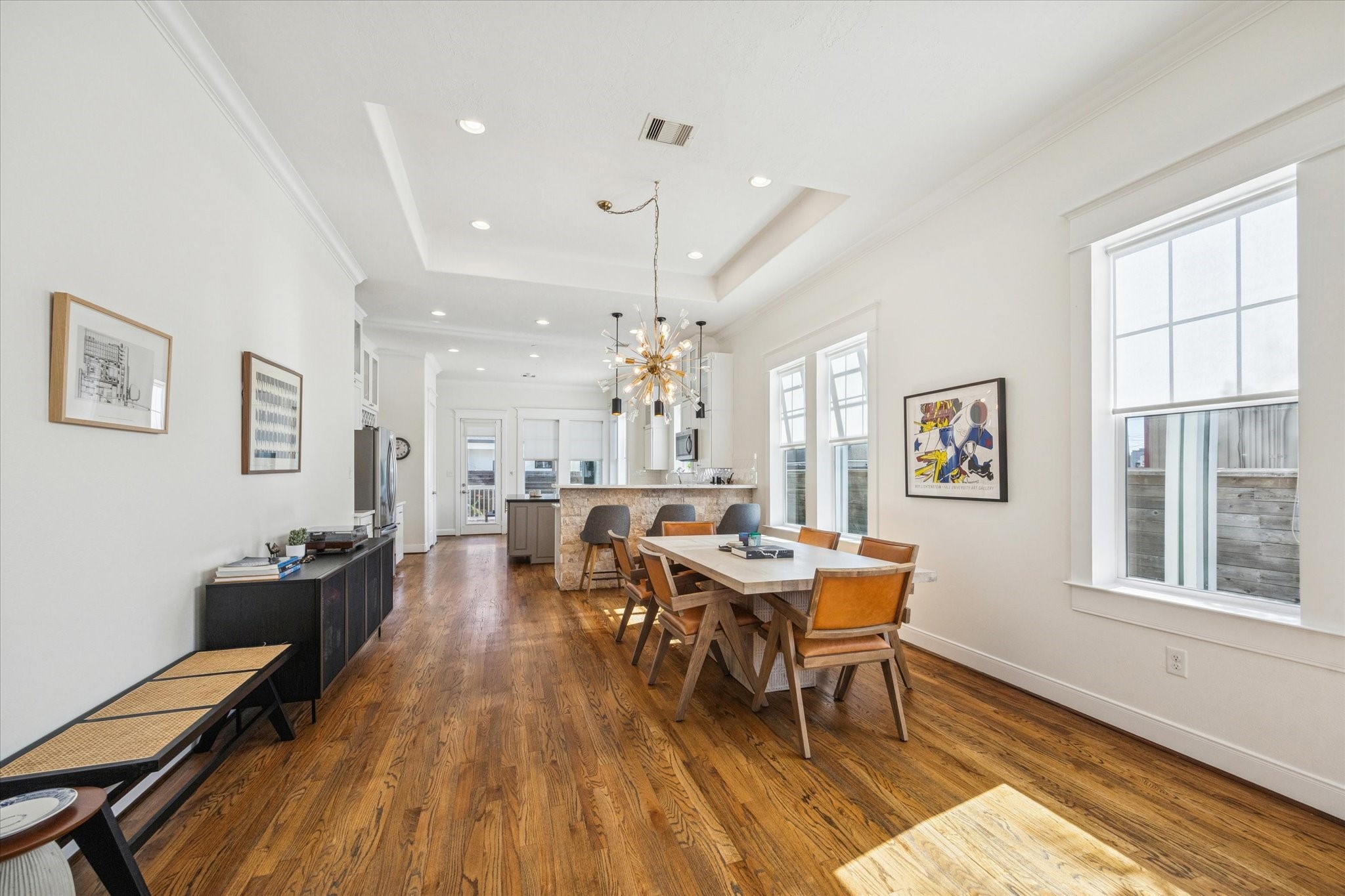304 Walton Street Houston, TX 77009 - Photo 7 of 28 The home has many beautiful light fixtures that really accent the style and charm of the home.