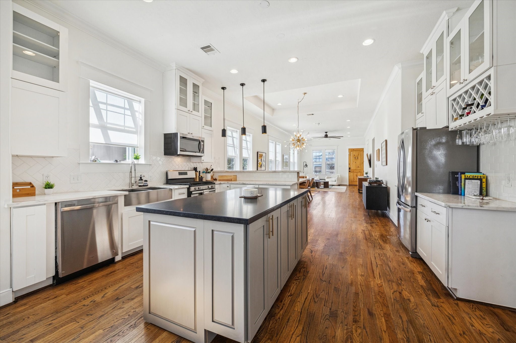 304 Walton Street Houston, TX 77009 - Photo 8 of 28 The kitchen offers beautiful marble countertops, island, top notch appliances and plenty of storage. Great set up for entertaining your guests.