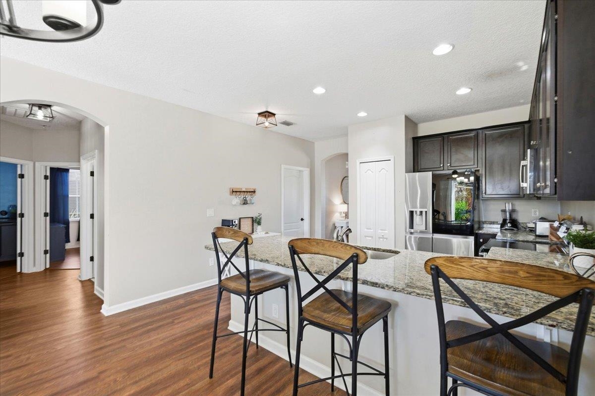30 Levante Way St. Augustine, FL 32086 - Photo 13 of 40 a dining room with furniture and wooden floor