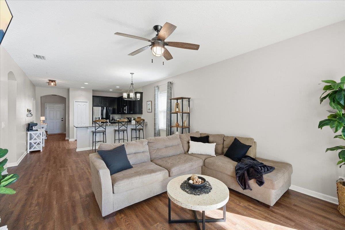 30 Levante Way St. Augustine, FL 32086 - Photo 16 of 40 a living room with furniture and kitchen view