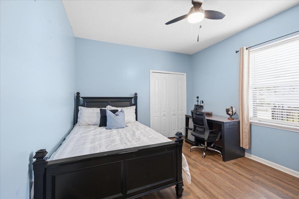 30 Levante Way St. Augustine, FL 32086 - Photo 28 of 40 a bedroom with a bed and a table in it