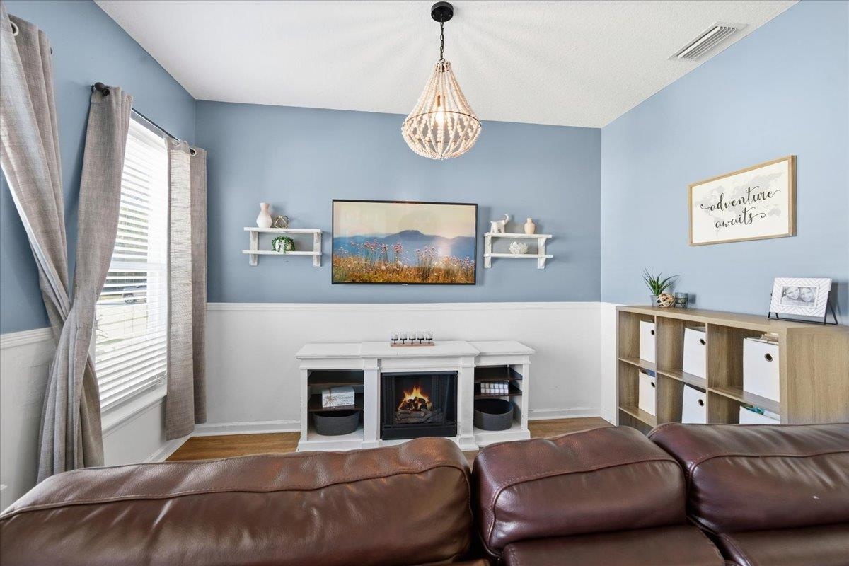 30 Levante Way St. Augustine, FL 32086 - Photo 6 of 40 a bedroom with furniture and a fireplace