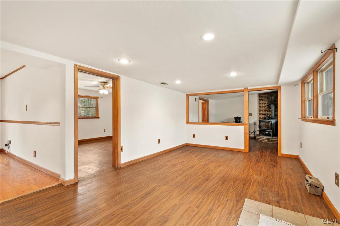 2461 Mountain Road Stroudsburg, PA 18360 - Photo 8 of 40 a view of an empty room with wooden floor and a window