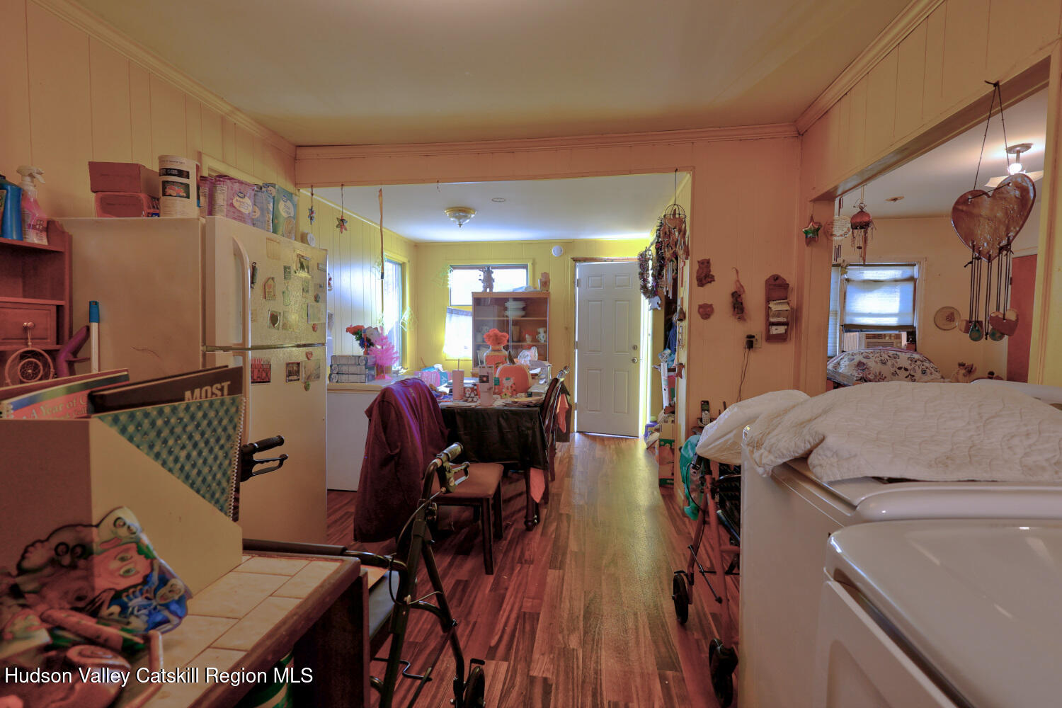 60 North Street Catskill, NY 12414 - Photo 35 of 50 a view of a livingroom and dining room and wooden floor