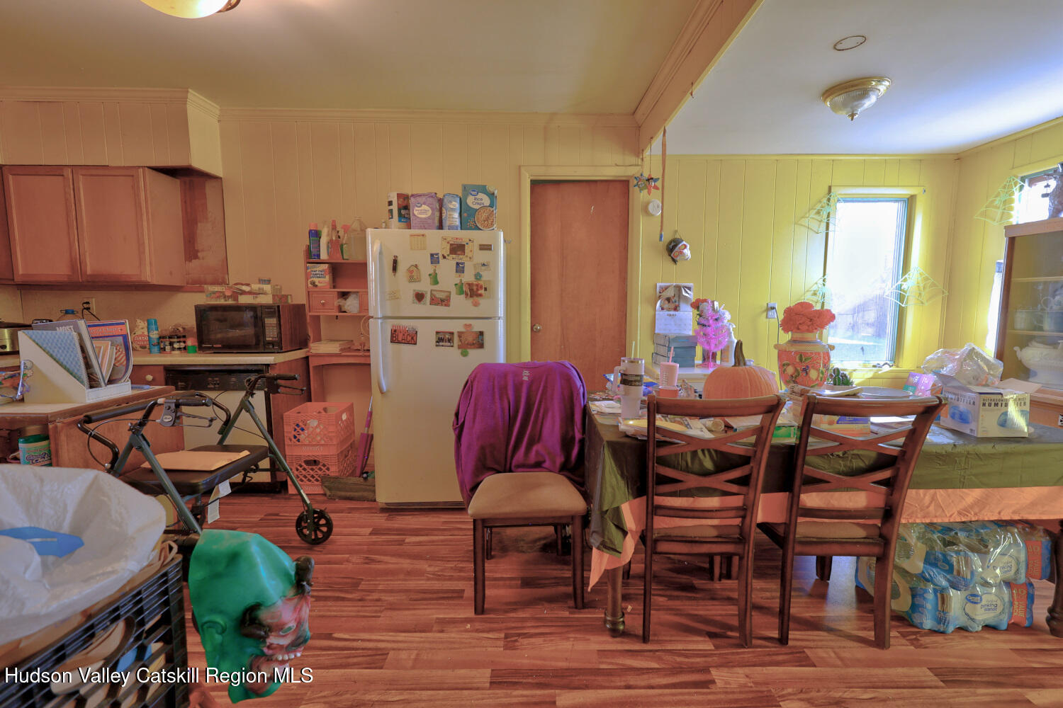 60 North Street Catskill, NY 12414 - Photo 36 of 50 a view of a dining room with furniture one side kitchen view and wooden floor