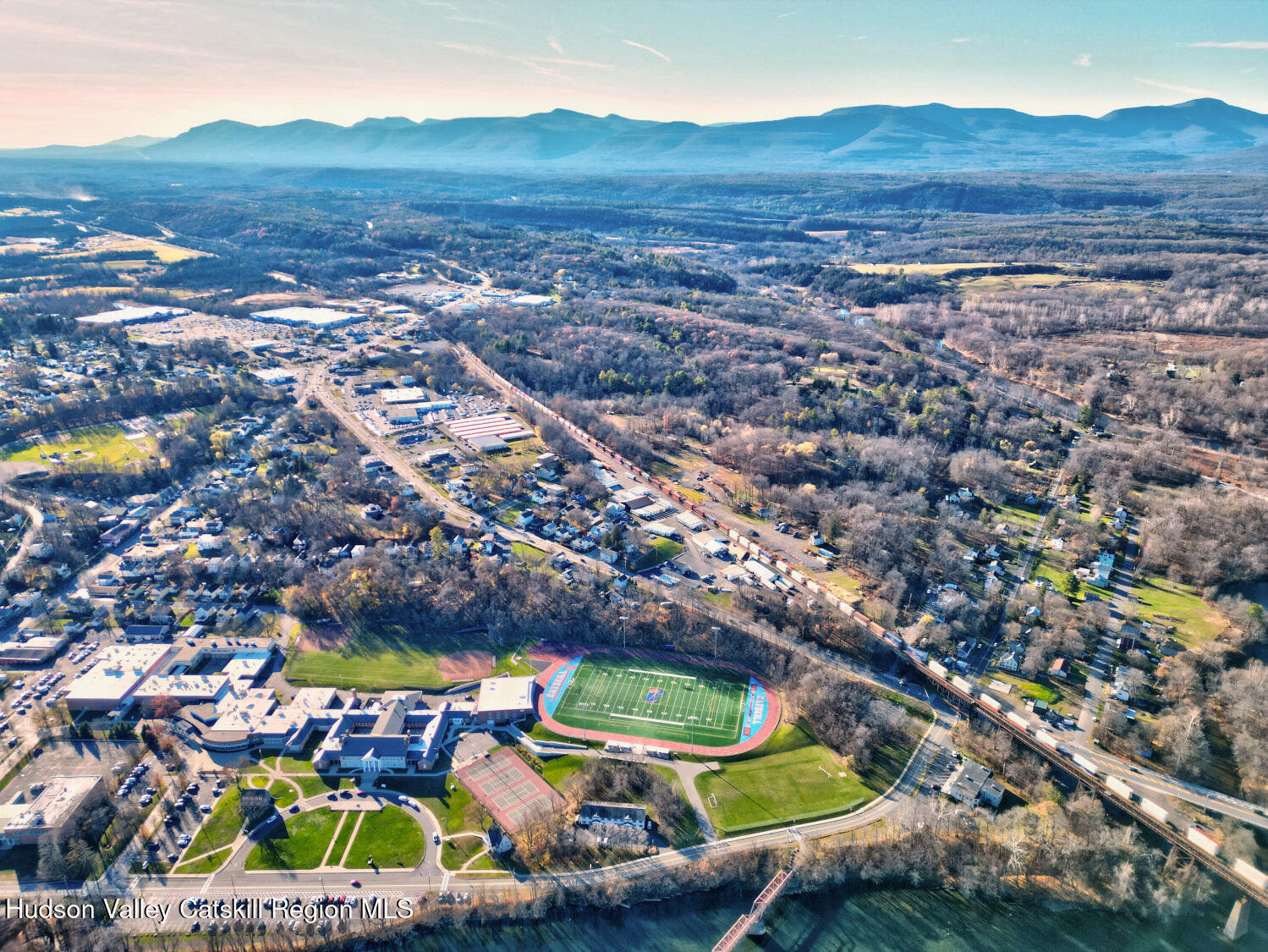 60 North Street Catskill, NY 12414 - Photo 48 of 50 an aerial view of residential houses with outdoor space and swimming pool