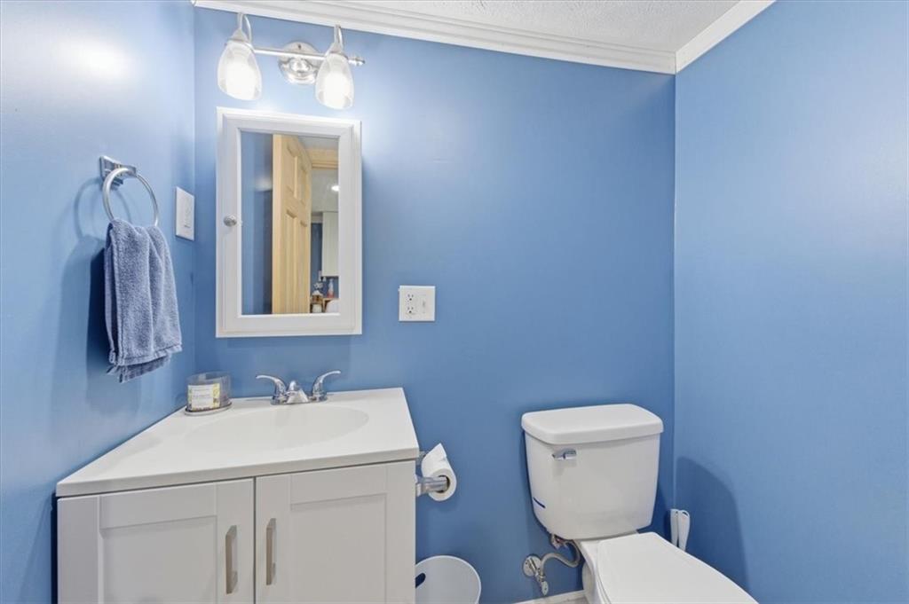 795 Geidel Road Ford City, PA 16226 - Photo 17 of 35 a bathroom with a toilet sink and mirror