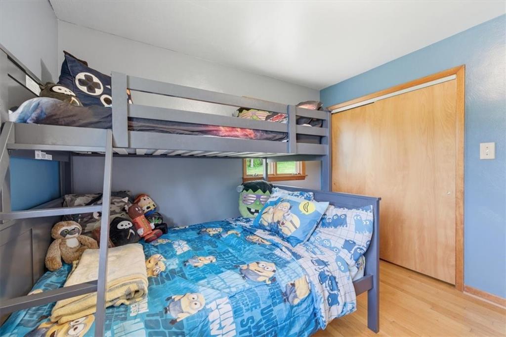 795 Geidel Road Ford City, PA 16226 - Photo 25 of 35 a bedroom with a bed and wooden floor