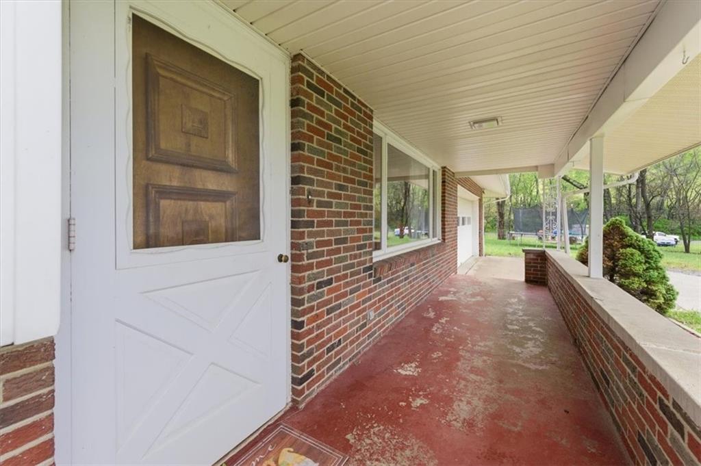 795 Geidel Road Ford City, PA 16226 - Photo 4 of 35 a view of a house with a porch