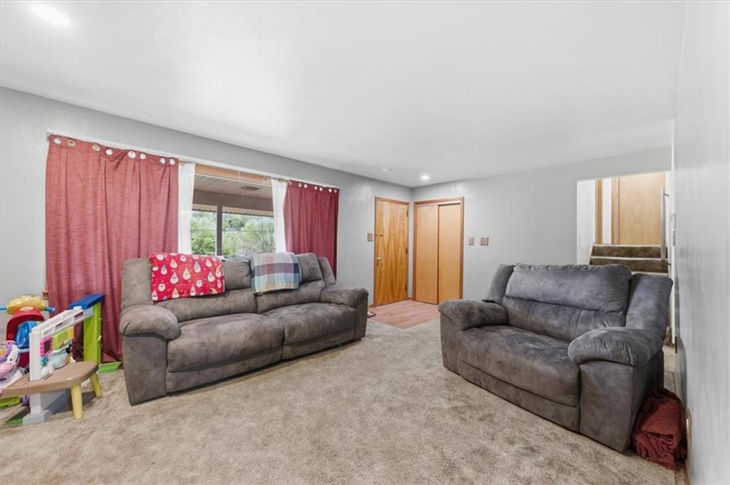 795 Geidel Road Ford City, PA 16226 - Photo 7 of 35 a living room with furniture and a window
