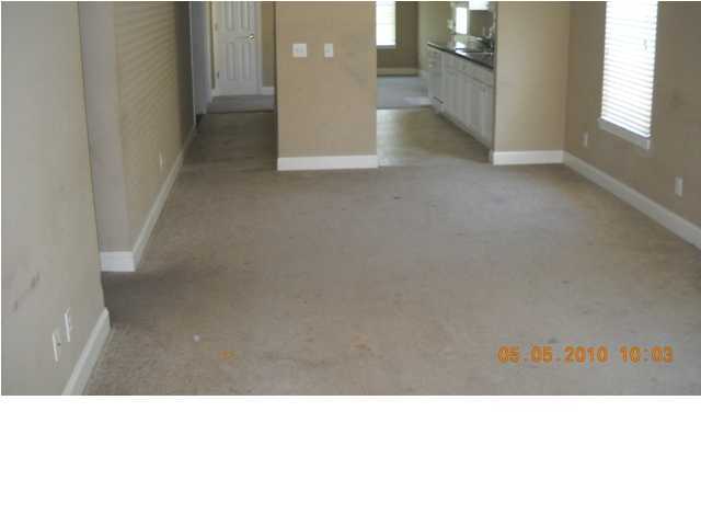 49 Indian Woman Road Santa Rosa Beach, FL 32459 - Photo 2 of 10 a open living room with a window