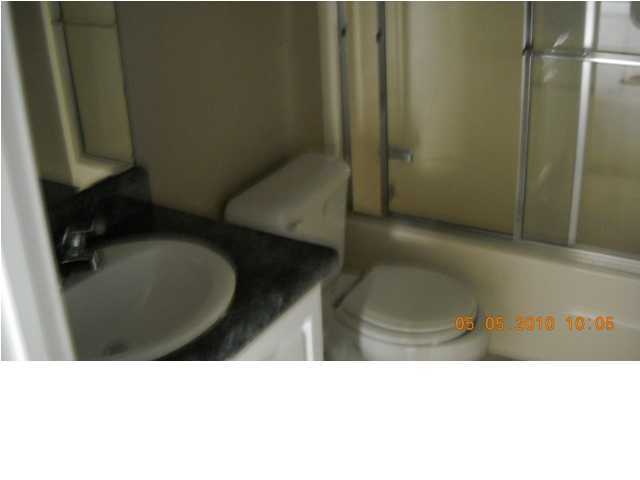 49 Indian Woman Road Santa Rosa Beach, FL 32459 - Photo 10 of 10 a bathroom with a sink toilet and shower
