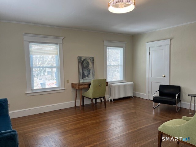 1946 Chapel Street New Haven, CT 06515 - Photo 4 of 23 a living room with furniture and a window