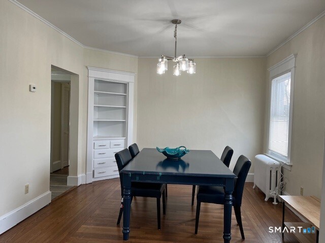 1946 Chapel Street New Haven, CT 06515 - Photo 6 of 23 a view of a dining room with a table and chairs