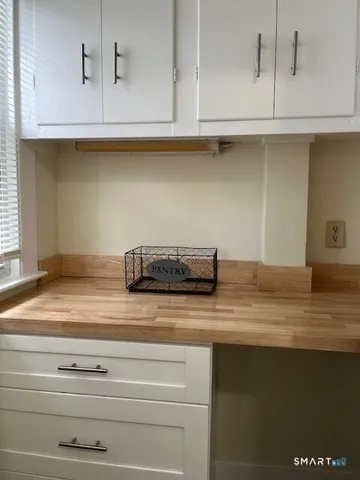 a close view of kitchen countertops with stove