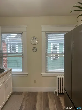 a view of a door and a window in a room