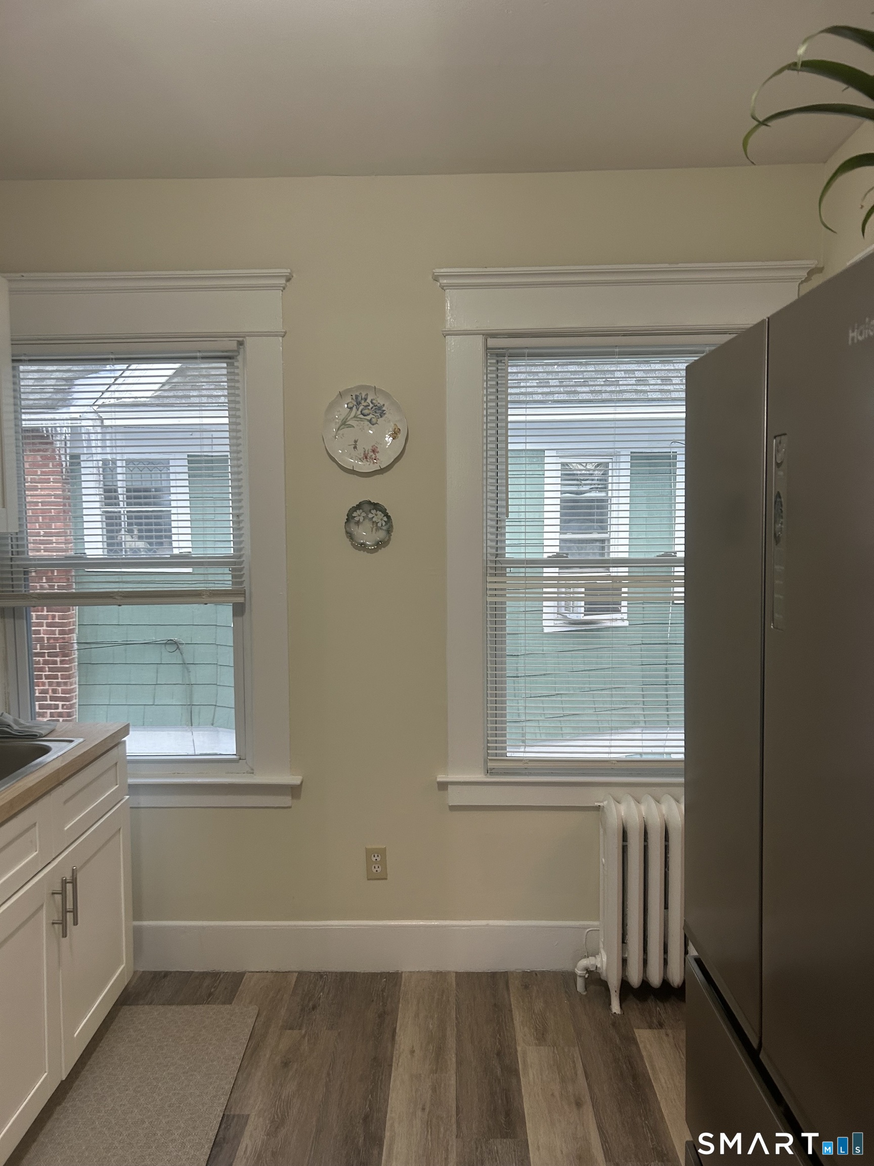 1946 Chapel Street New Haven, CT 06515 - Photo 9 of 23 a view of a door and a window in a room