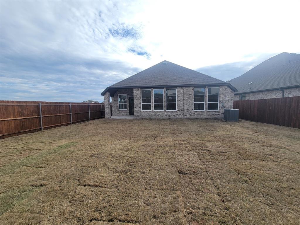 5032 Picasso Road Royse City, TX 75189 - Photo 14 of 15 a view of a house with a yard