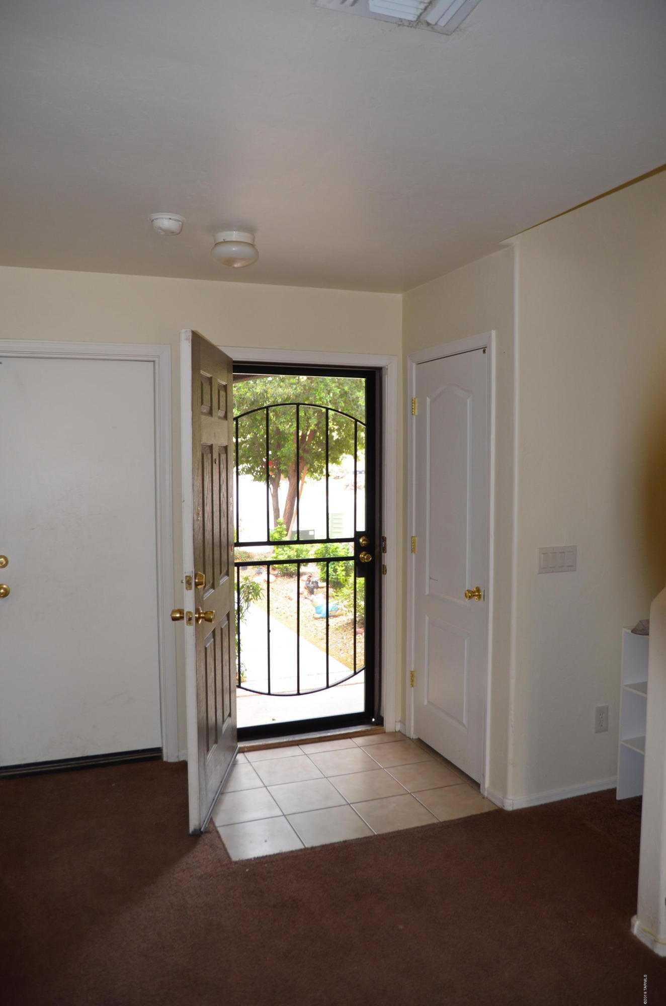 698 West Ash Ridge Drive Green Valley, AZ 85614 - Photo 7 of 19 an empty room with windows