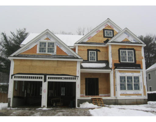 44 Longacre Road Needham, MA 02492 - Photo 2 of 4 a front view of a house with a yard