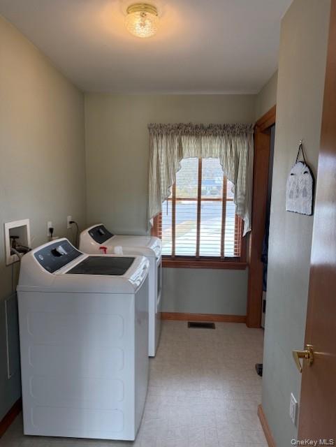 4 Grapevine Place Poughkeepsie, NY 12603 - Photo 12 of 31 a utility room with washer and dryer