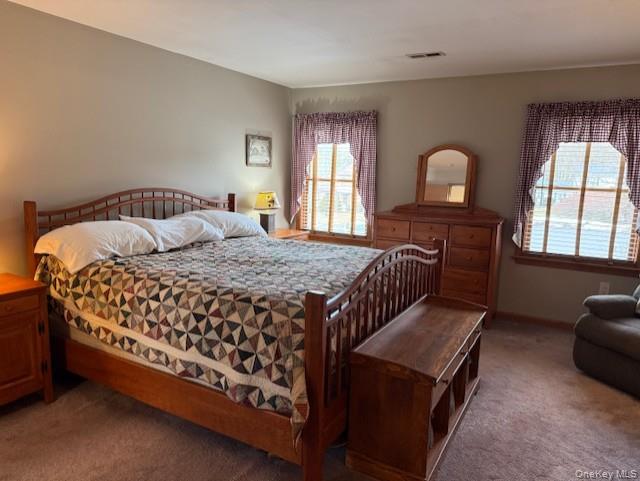 4 Grapevine Place Poughkeepsie, NY 12603 - Photo 17 of 31 a bedroom with a bed and window