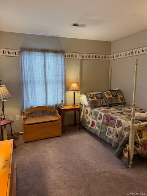 4 Grapevine Place Poughkeepsie, NY 12603 - Photo 23 of 31 a bedroom with bed and a window