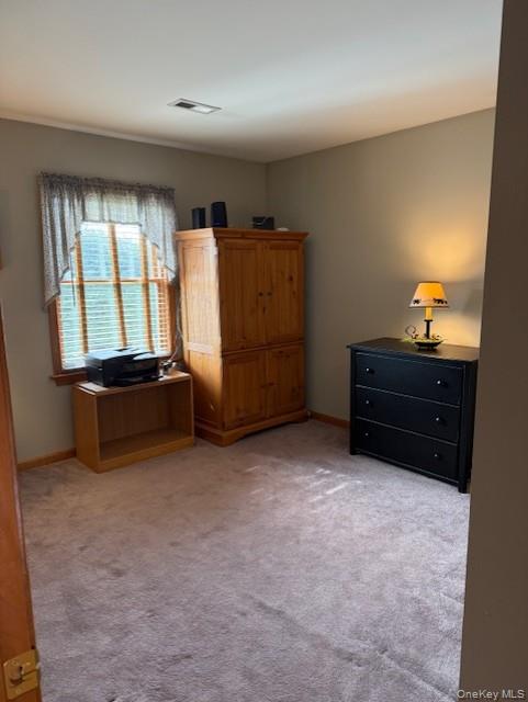 4 Grapevine Place Poughkeepsie, NY 12603 - Photo 24 of 31 a room with furniture and a dresser