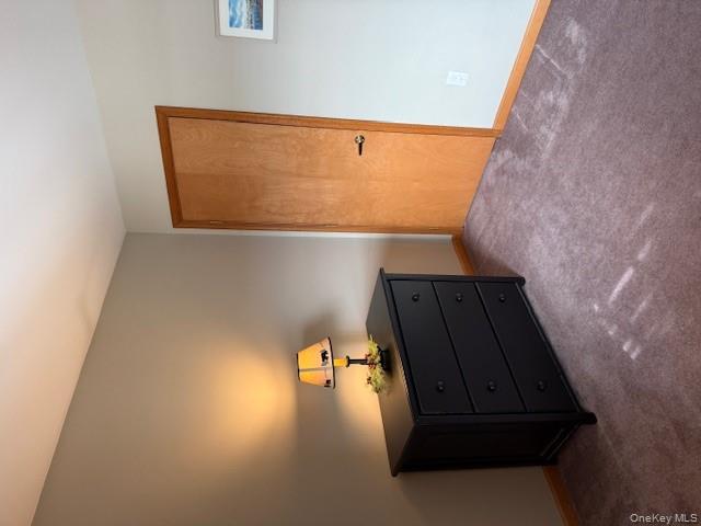 4 Grapevine Place Poughkeepsie, NY 12603 - Photo 25 of 31 a room with a dresser