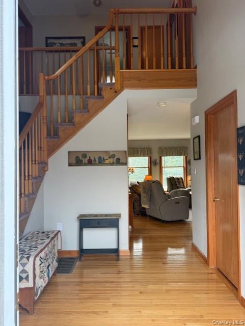 4 Grapevine Place Poughkeepsie, NY 12603 - Photo 3 of 31 a living room with furniture and a wooden floor