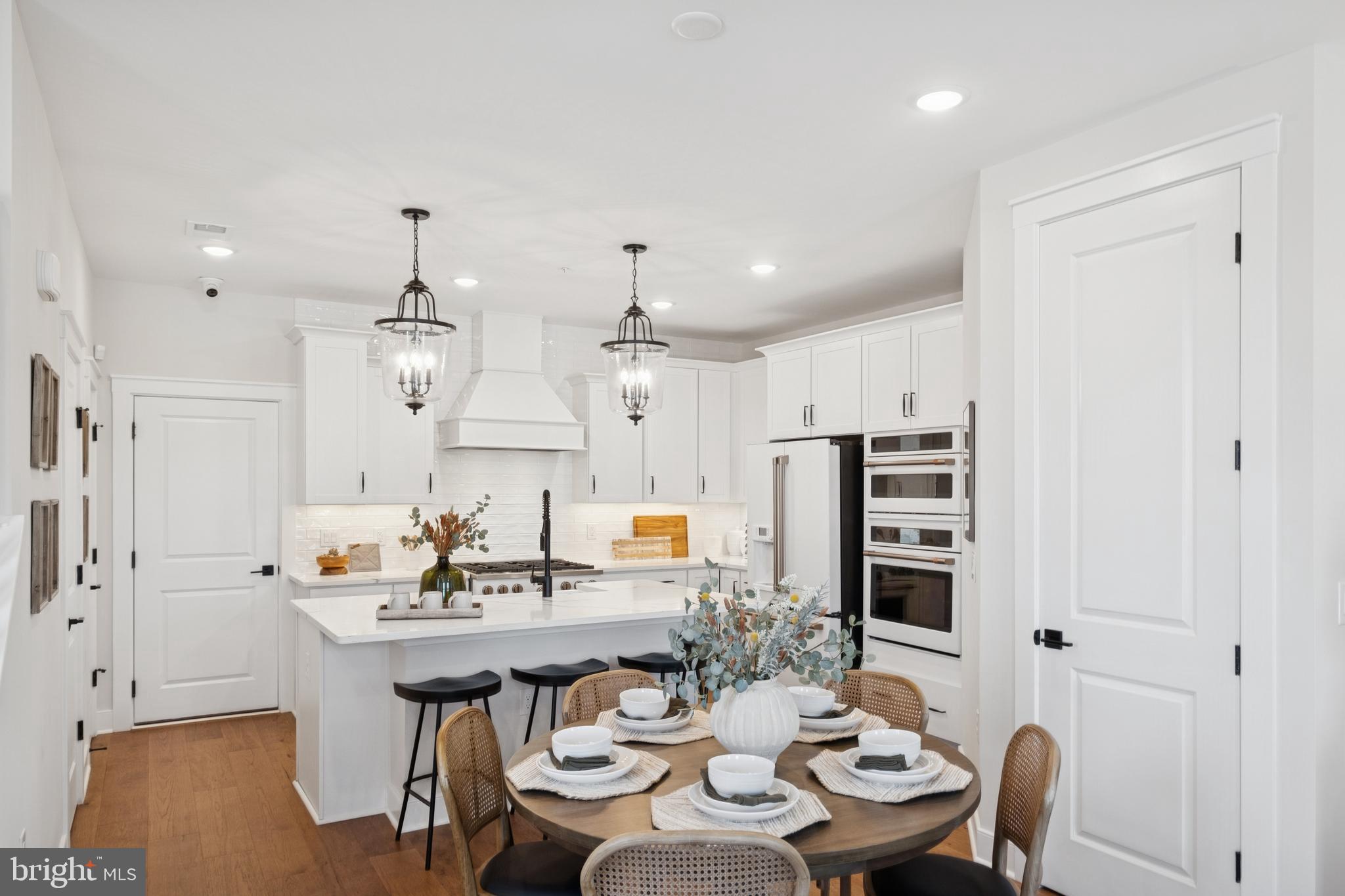 14961 Deco Circle, Unit LOT29 Chantilly, VA 20151 - Photo 13 of 35 a view of a dining room with furniture