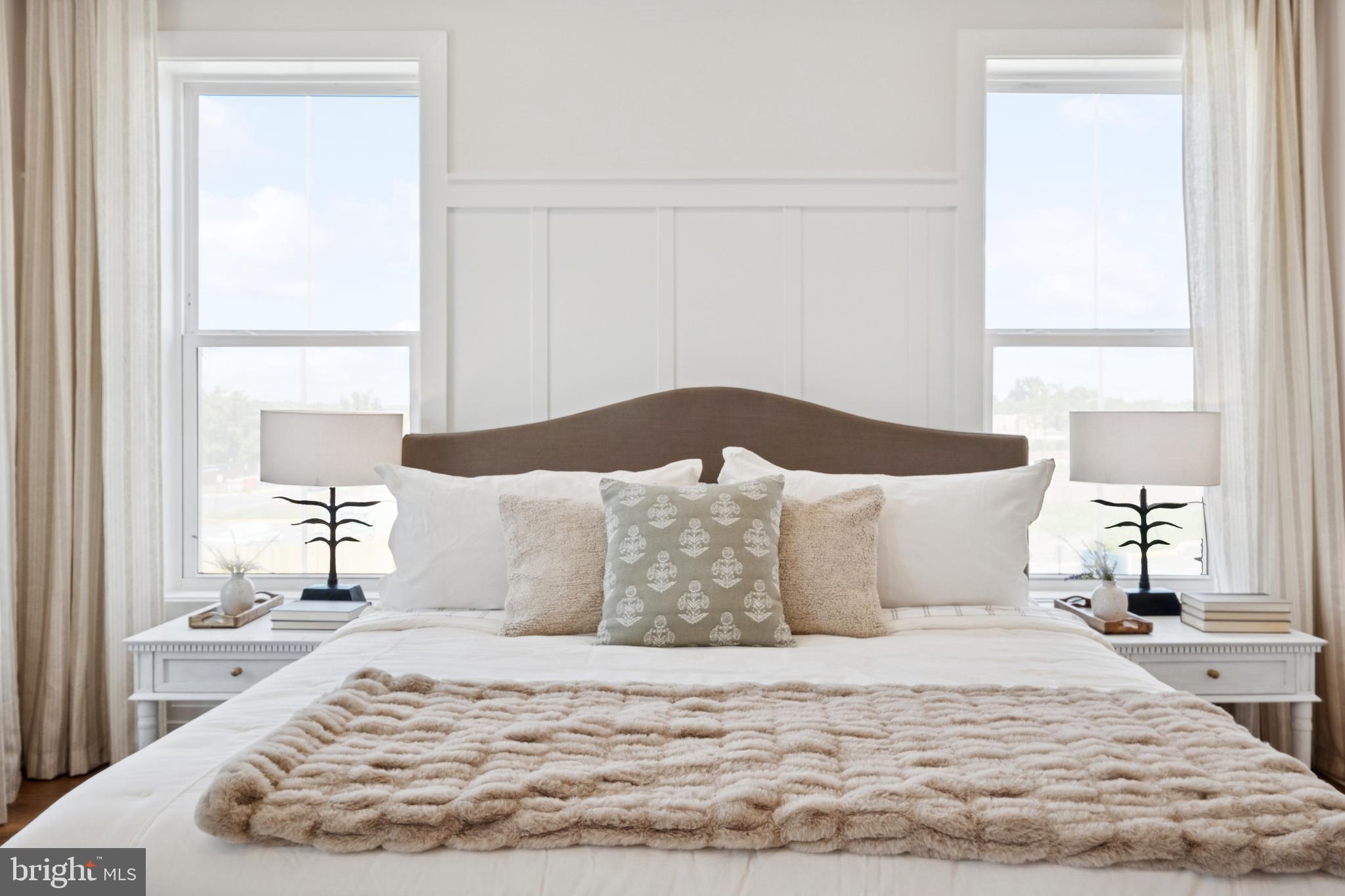 14961 Deco Circle, Unit LOT29 Chantilly, VA 20151 - Photo 20 of 35 a large bed sitting in a bedroom next to a window