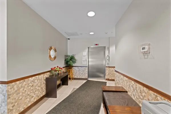 a kitchen with stainless steel appliances a refrigerator and a stove